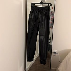 Vegan leather jogger. Super sick esp for a festival.